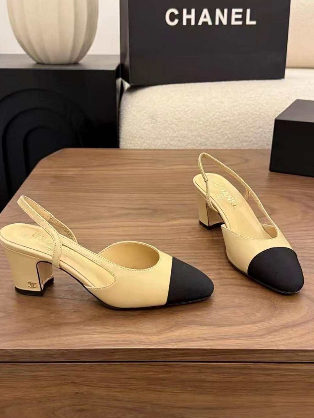 CHANEL Beige Leather Black Toe Back Strap Mid Heels